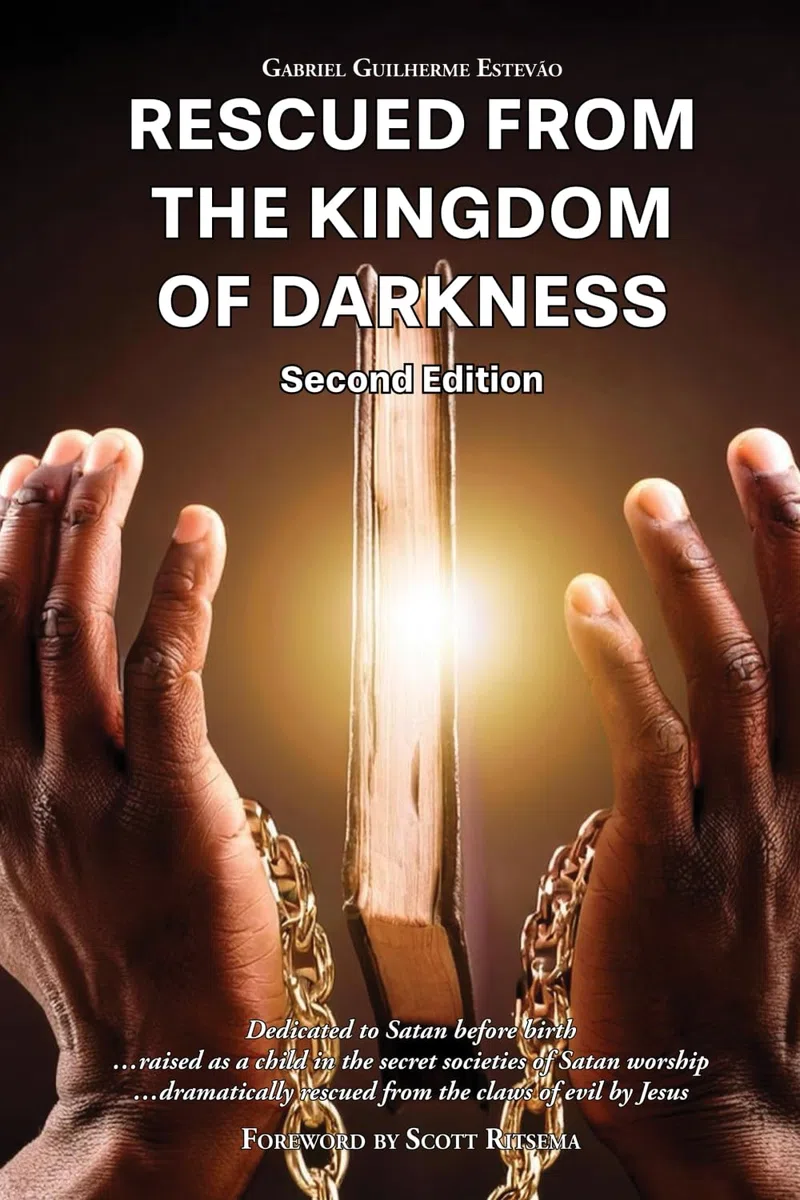 RESCUED FROM THE KINGDOM OF DARKNESS: Dedicated to Satan before birth, raised as a child in the secret societies of Satan worship, dramatically rescued from the claws of evil by Jesus Christ