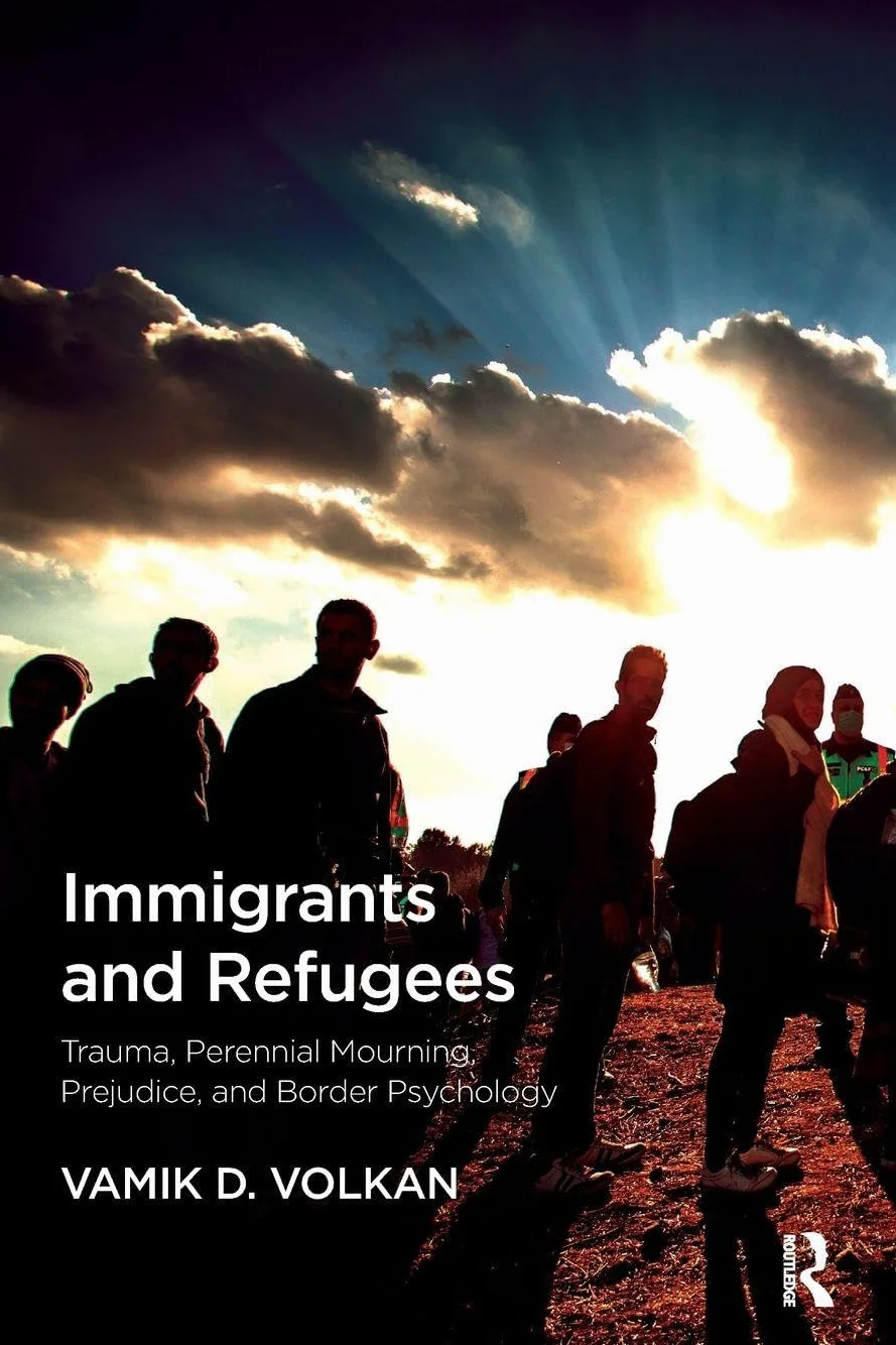 Immigrants and Refugees: Trauma, Perennial Mourning, Prejudice, and Border Psychology